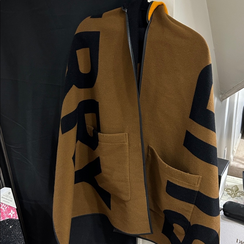 Burberry Black and Brown reverse poncho with hood